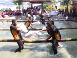 Sambut Hari Bhayangkara ke-79 Polres Bojonegoro Gelar Lomba Perang Guling