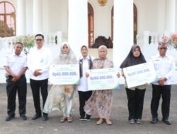 Ahli Waris Rasakan Manfaat Kepesertaan Jaminan Sosial Pekerja Rentan Dikaver Pemkab Bojonegoro